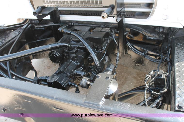 image for item H1696 1998 Mack DM690S mixer truck