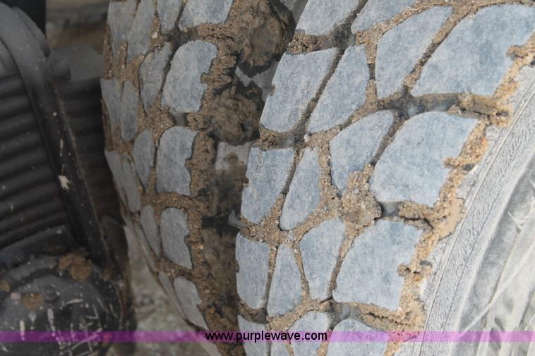 image for item H1696 1998 Mack DM690S mixer truck