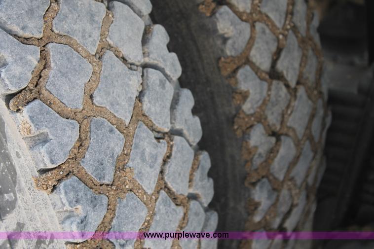 image for item H1696 1998 Mack DM690S mixer truck