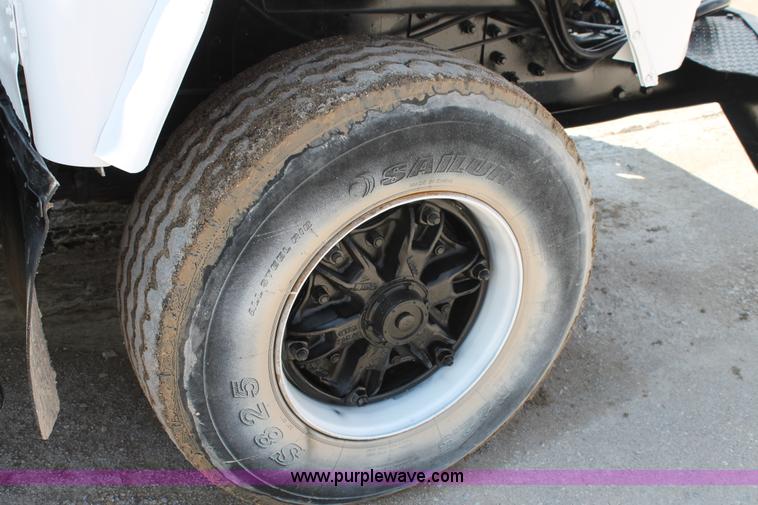 image for item H1696 1998 Mack DM690S mixer truck