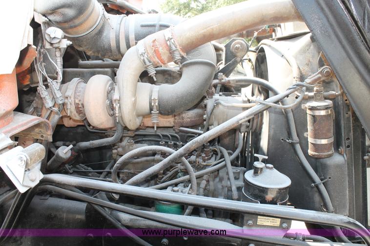 image for item H1696 1998 Mack DM690S mixer truck