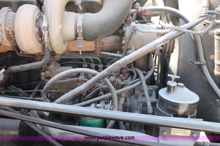 image for item H1696 1998 Mack DM690S mixer truck