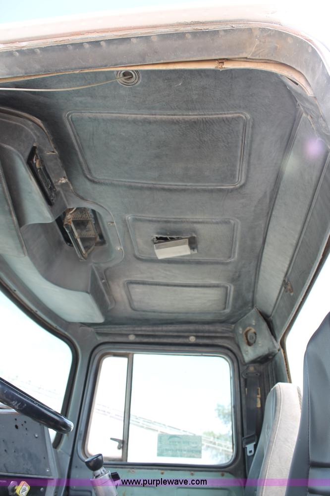 image for item H1696 1998 Mack DM690S mixer truck