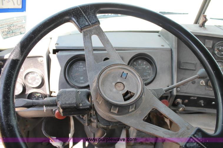 image for item H1696 1998 Mack DM690S mixer truck