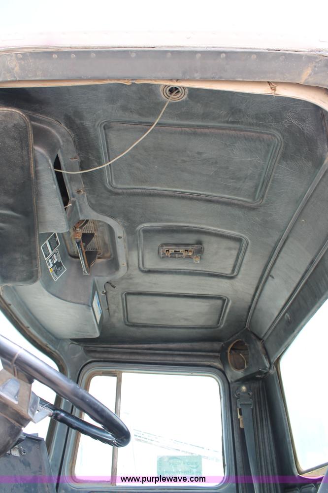 image for item H1697 1997 Mack DM690S mixer truck