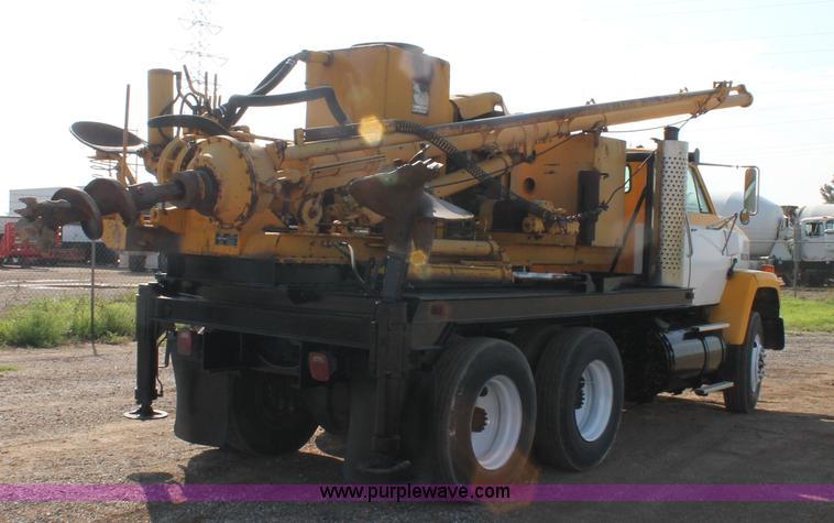 image for item H1700 1988 GMC Brigadier digger derrick truck