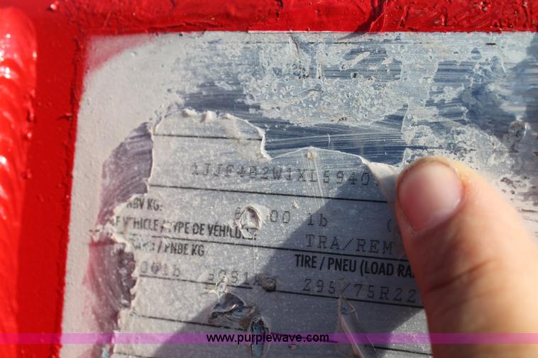 image for item H1701 1999 Wabash flatbed trailer