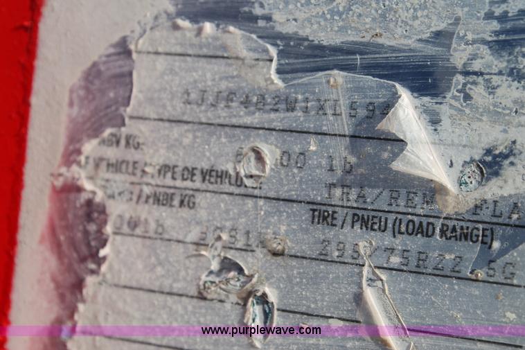 image for item H1701 1999 Wabash flatbed trailer