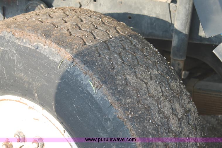 image for item H1703 1989 Mack RD690S mixer truck