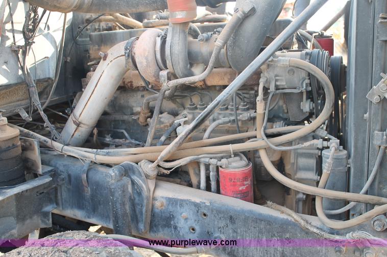 image for item H1703 1989 Mack RD690S mixer truck