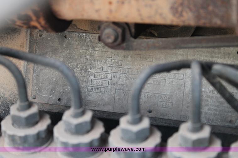 image for item H1703 1989 Mack RD690S mixer truck