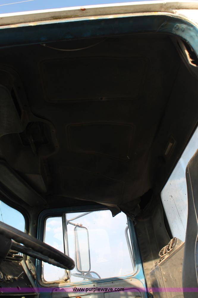 image for item H1703 1989 Mack RD690S mixer truck