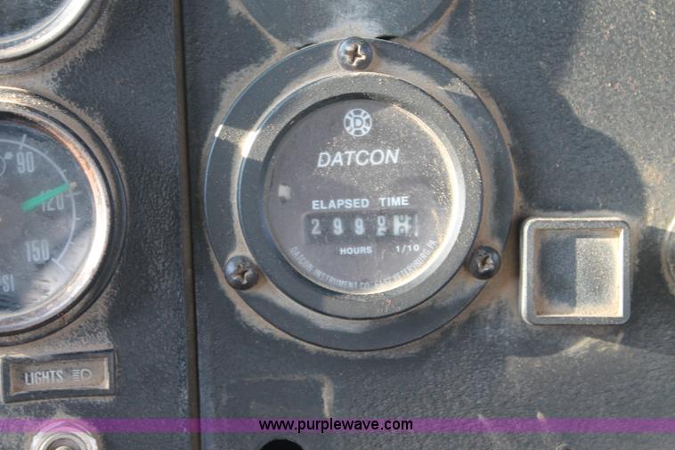 image for item H1703 1989 Mack RD690S mixer truck