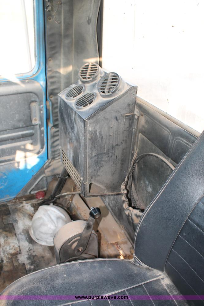 image for item H1703 1989 Mack RD690S mixer truck