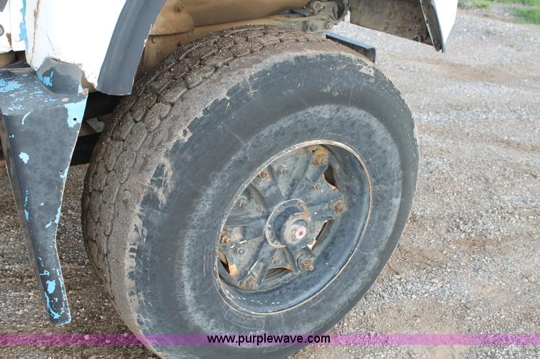 image for item H1706 1991 Mack RD690S mixer truck