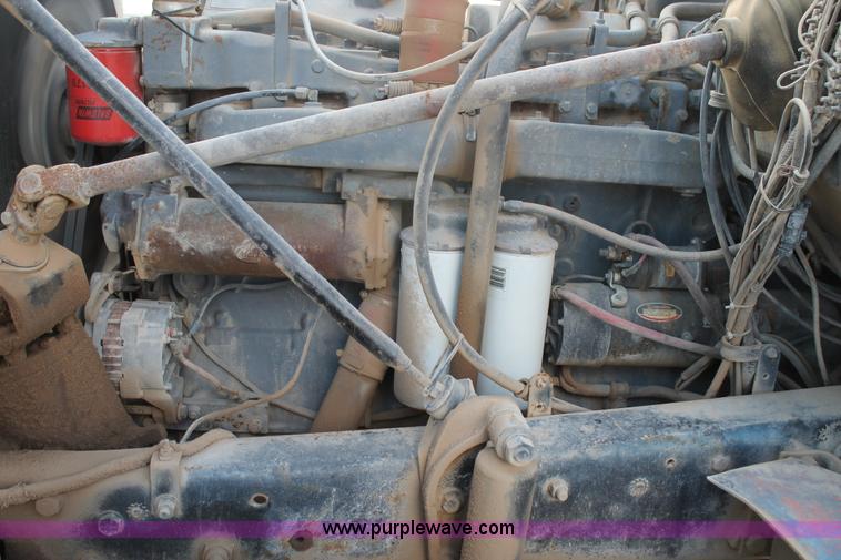 image for item H1706 1991 Mack RD690S mixer truck