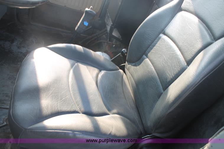 image for item H1707 1991 Mack RD690S mixer truck