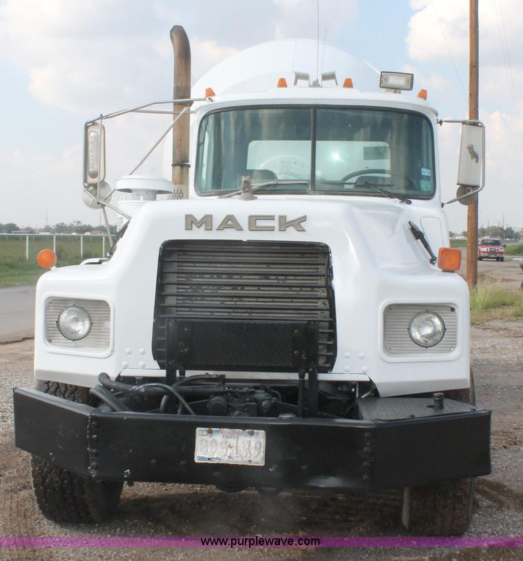 image for item H1709 1994 Mack DM690S mixer truck
