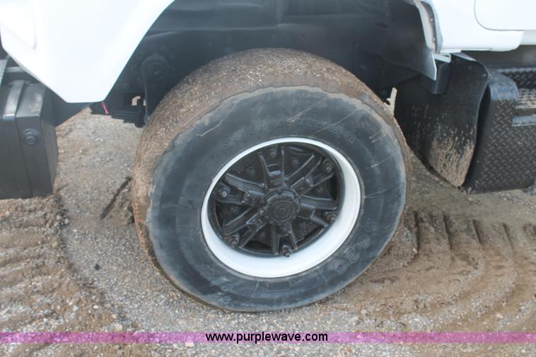 image for item H1709 1994 Mack DM690S mixer truck