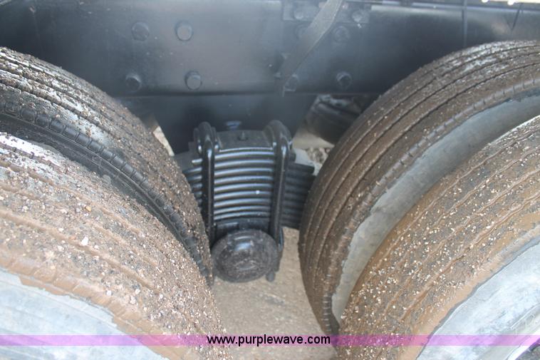 image for item H1709 1994 Mack DM690S mixer truck