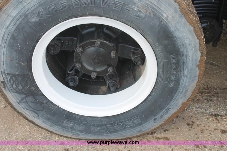 image for item H1709 1994 Mack DM690S mixer truck