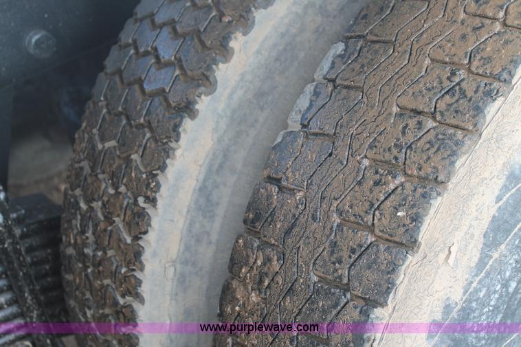 image for item H1709 1994 Mack DM690S mixer truck