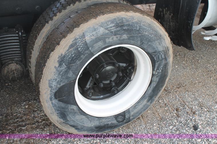 image for item H1709 1994 Mack DM690S mixer truck