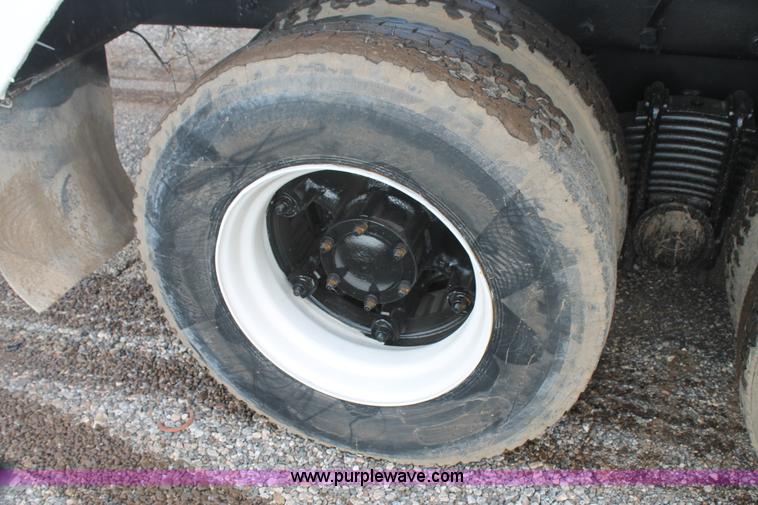 image for item H1709 1994 Mack DM690S mixer truck