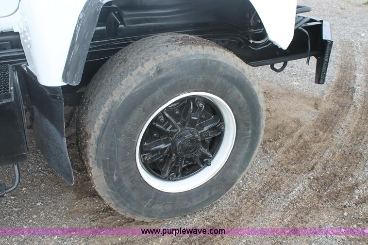 image for item H1709 1994 Mack DM690S mixer truck