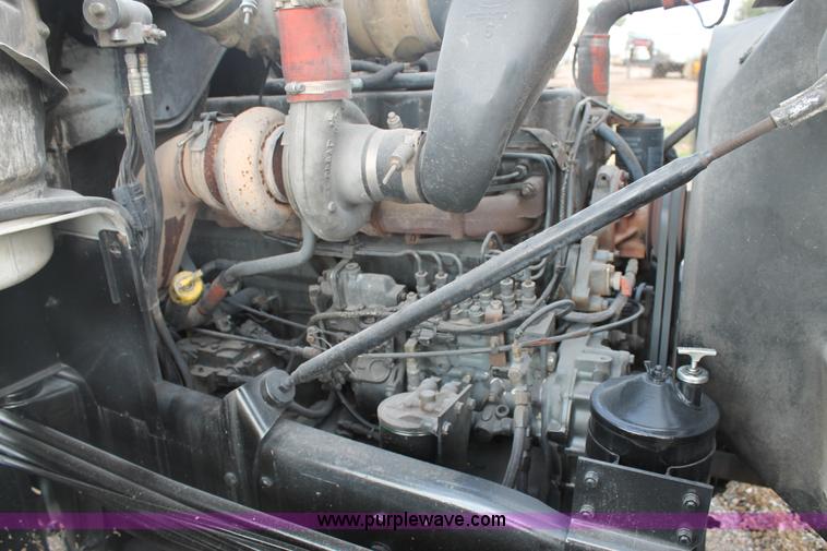 image for item H1709 1994 Mack DM690S mixer truck