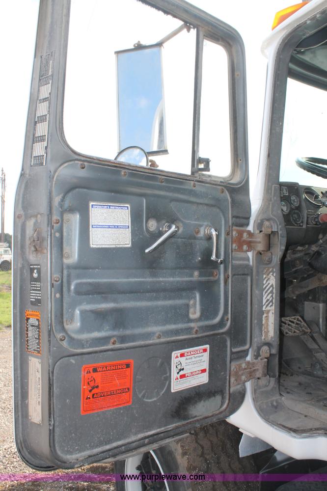 image for item H1709 1994 Mack DM690S mixer truck