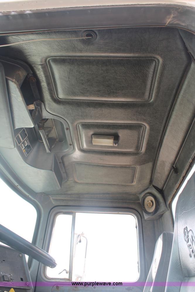 image for item H1709 1994 Mack DM690S mixer truck