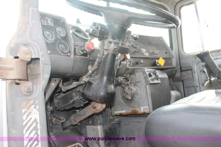 image for item H1709 1994 Mack DM690S mixer truck