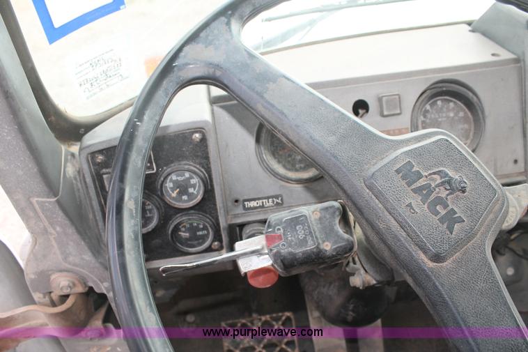 image for item H1709 1994 Mack DM690S mixer truck