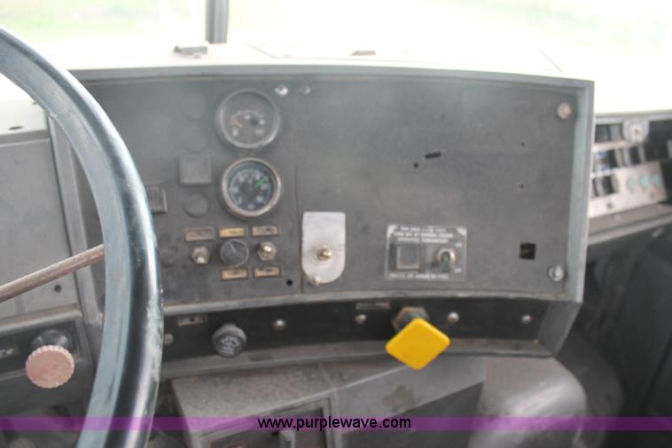 image for item H1709 1994 Mack DM690S mixer truck