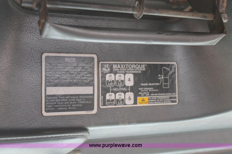 image for item H1709 1994 Mack DM690S mixer truck