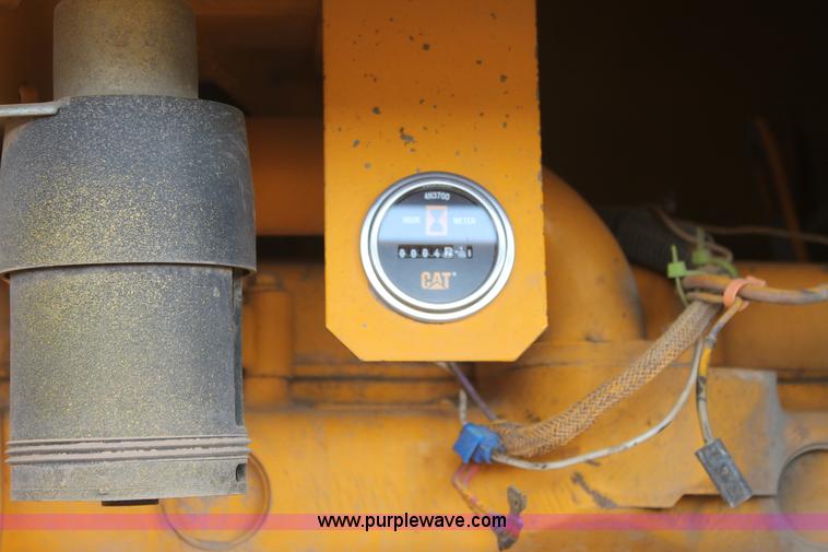 image for item H1714 1991 John Deere 670B articulated motor grader