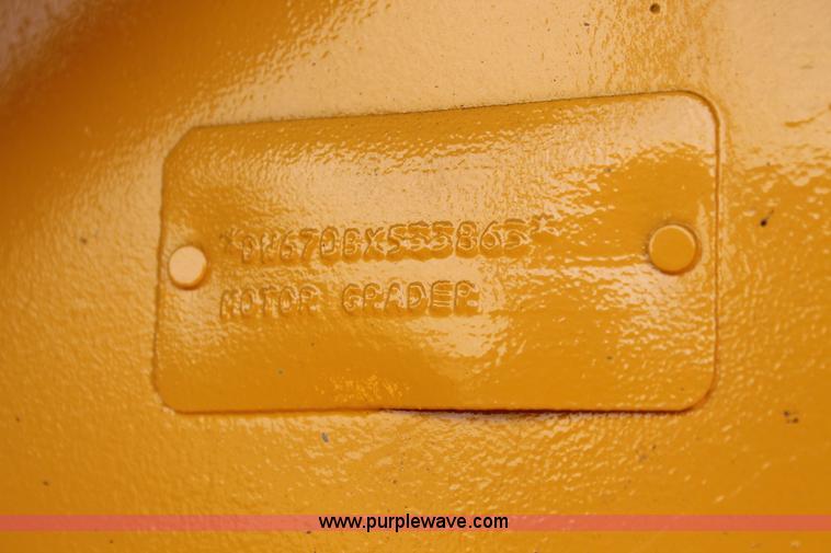 image for item H1714 1991 John Deere 670B articulated motor grader