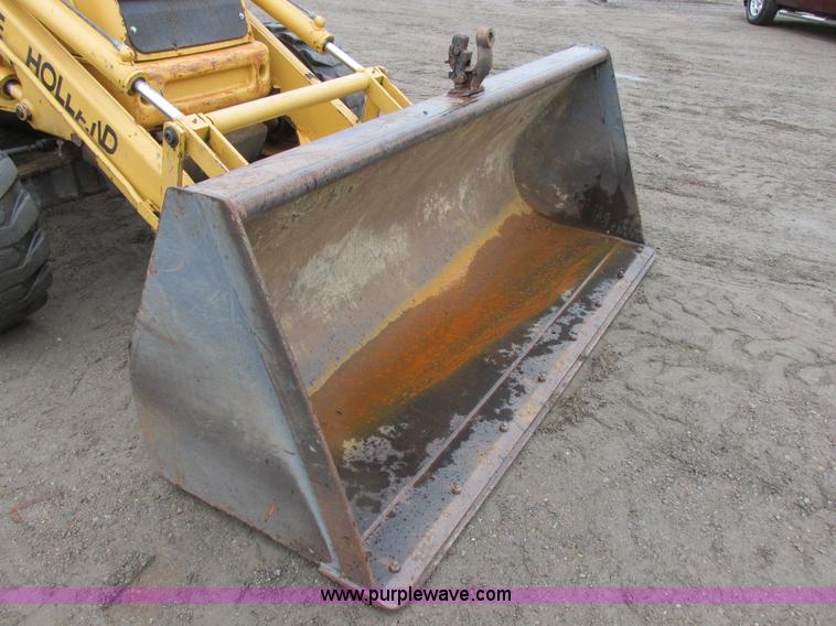 image for item I6033 1999 New Holland 655E backhoe