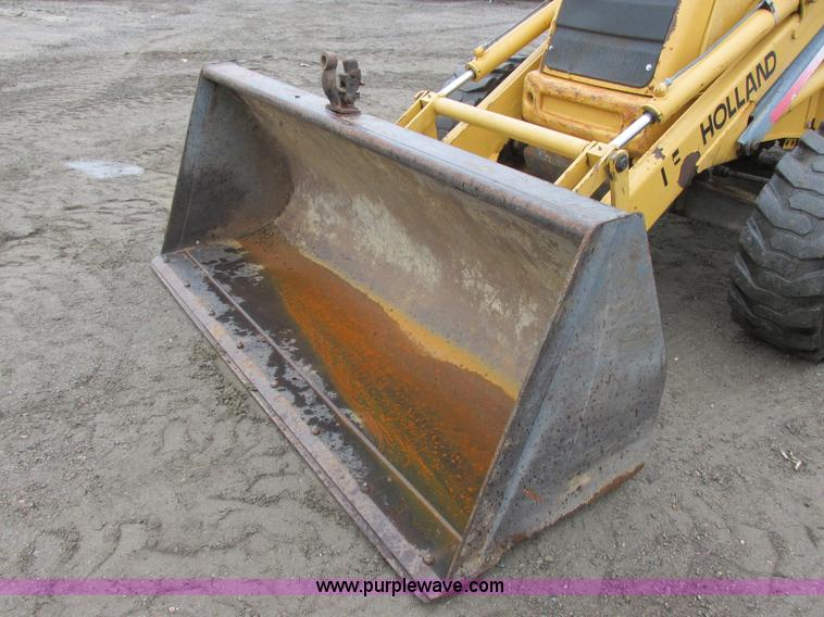 image for item I6033 1999 New Holland 655E backhoe