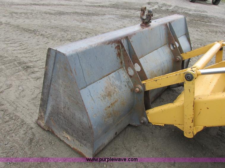 image for item I6033 1999 New Holland 655E backhoe