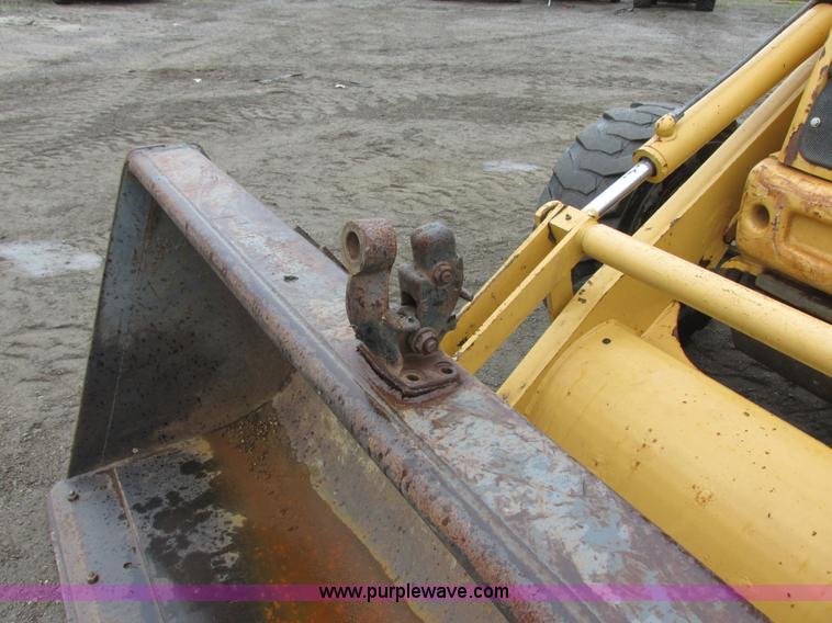 image for item I6033 1999 New Holland 655E backhoe