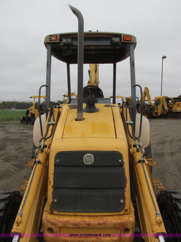 image for item I6033 1999 New Holland 655E backhoe