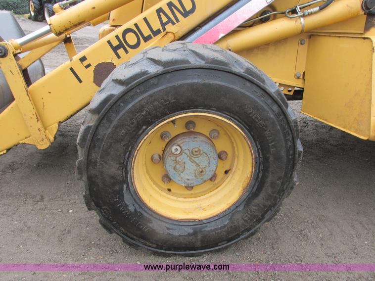 image for item I6033 1999 New Holland 655E backhoe