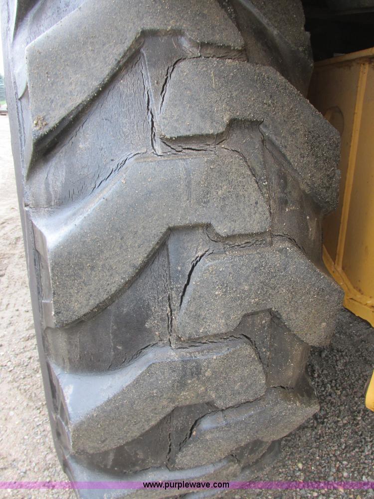 image for item I6033 1999 New Holland 655E backhoe