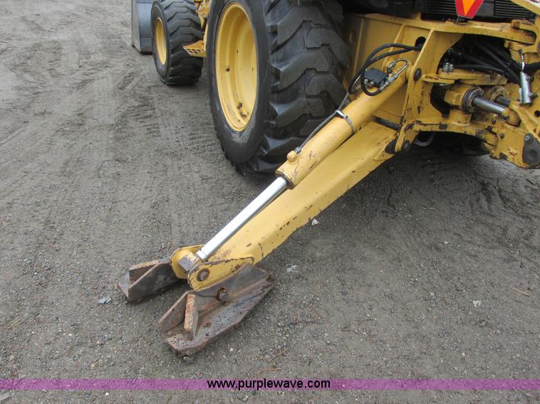 image for item I6033 1999 New Holland 655E backhoe