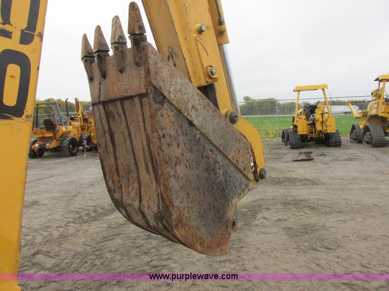 image for item I6033 1999 New Holland 655E backhoe