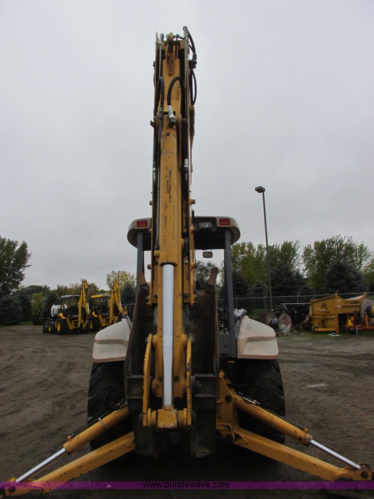 image for item I6033 1999 New Holland 655E backhoe