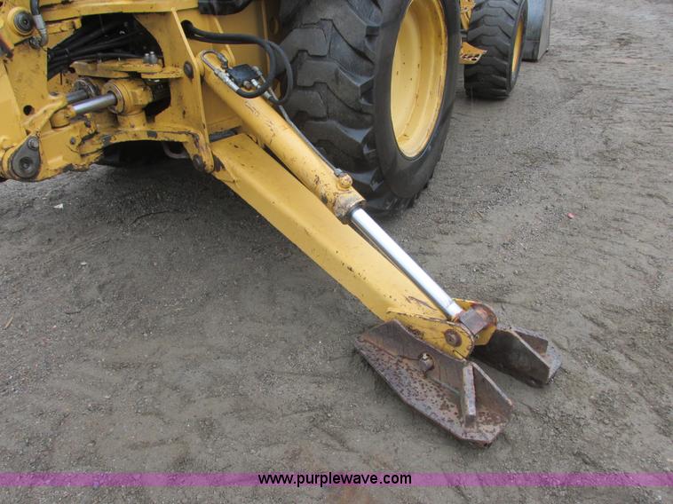 image for item I6033 1999 New Holland 655E backhoe
