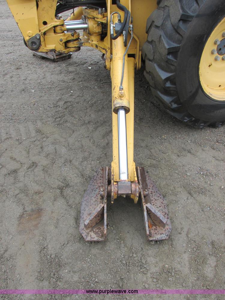 image for item I6033 1999 New Holland 655E backhoe
